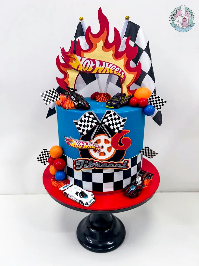 Hot Wheels Cake Birmingham — children’s birthday cake with orange racing track and cars.