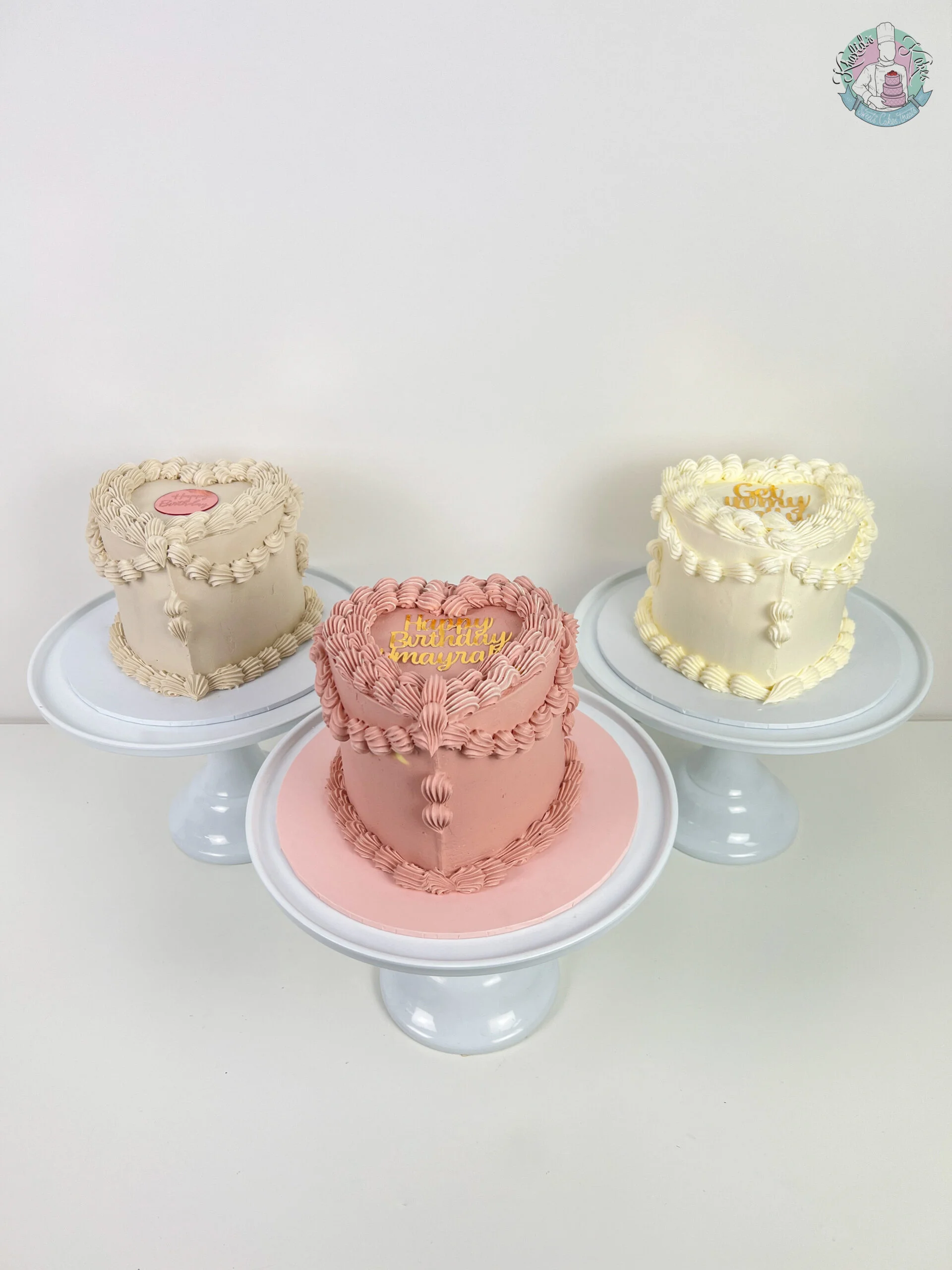 Heart Cake Birmingham, a heart shaped cake personalised with a message and colours, handmade by Khalids Kakes