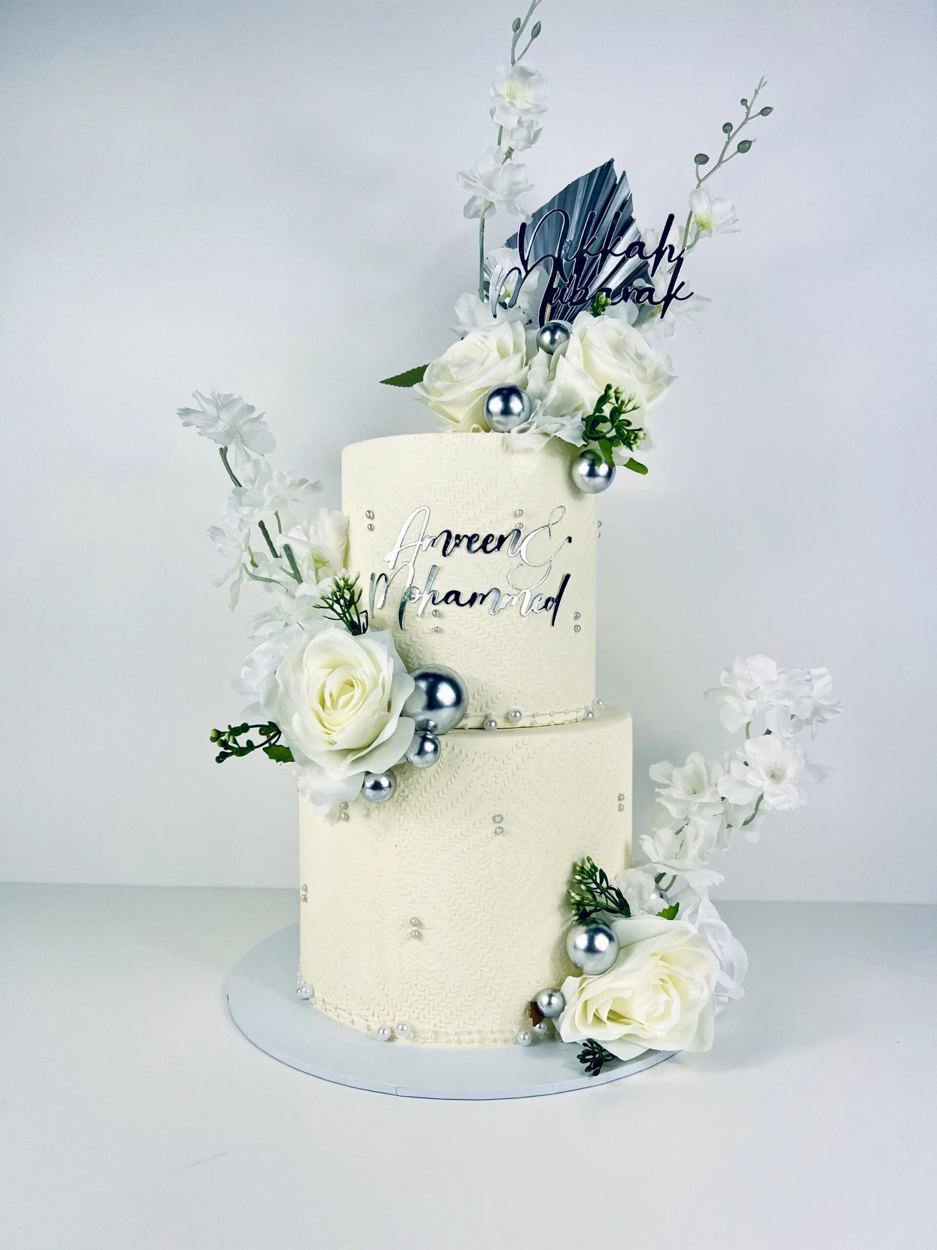Tiered Stencil Wedding Cake Birmingham — tiered cake with elegant stencil work and your choice of buttercream and flower colours.