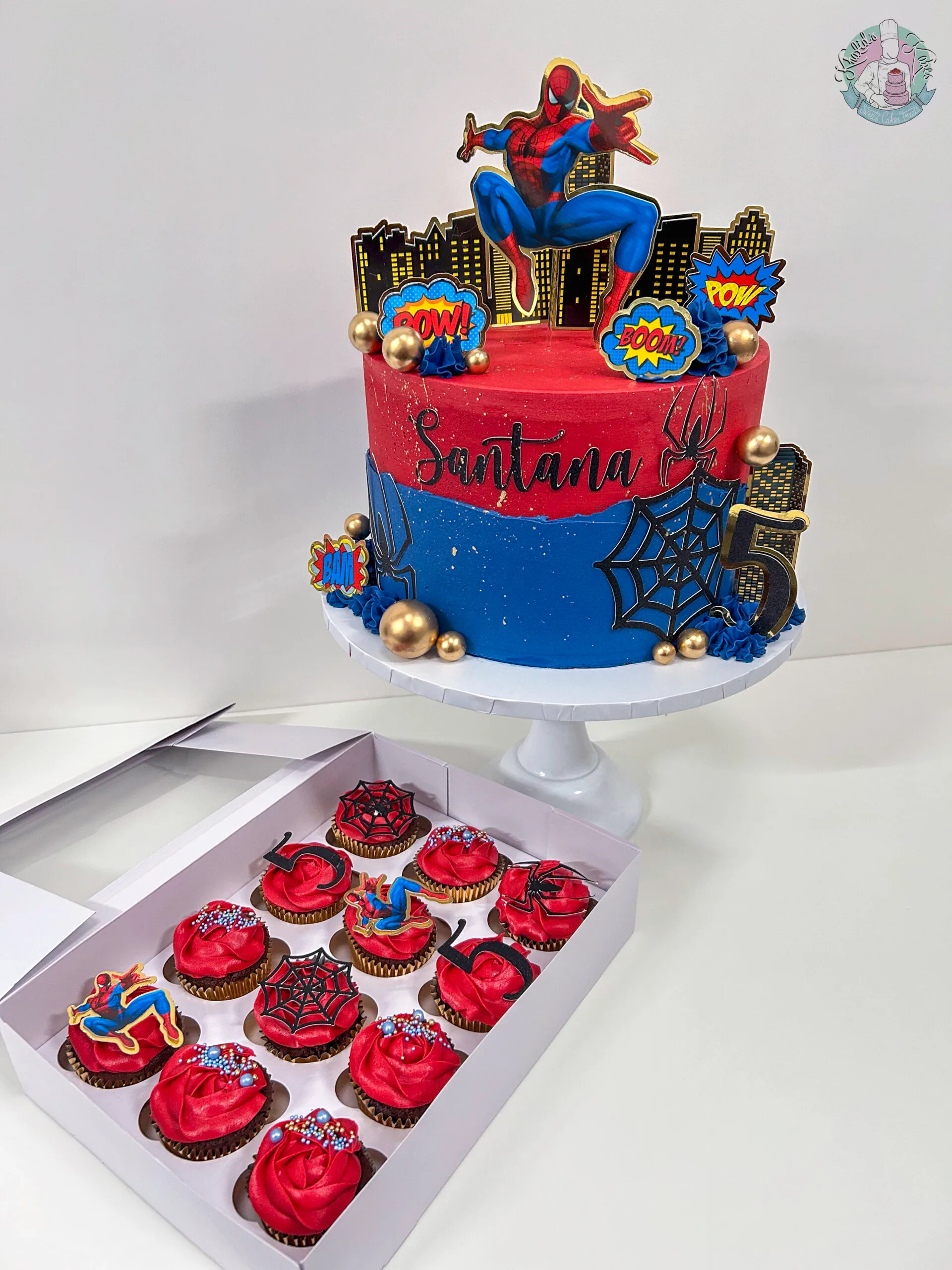 Spiderman Cake Birmingham — children’s birthday cake with red, blue and spider webs.