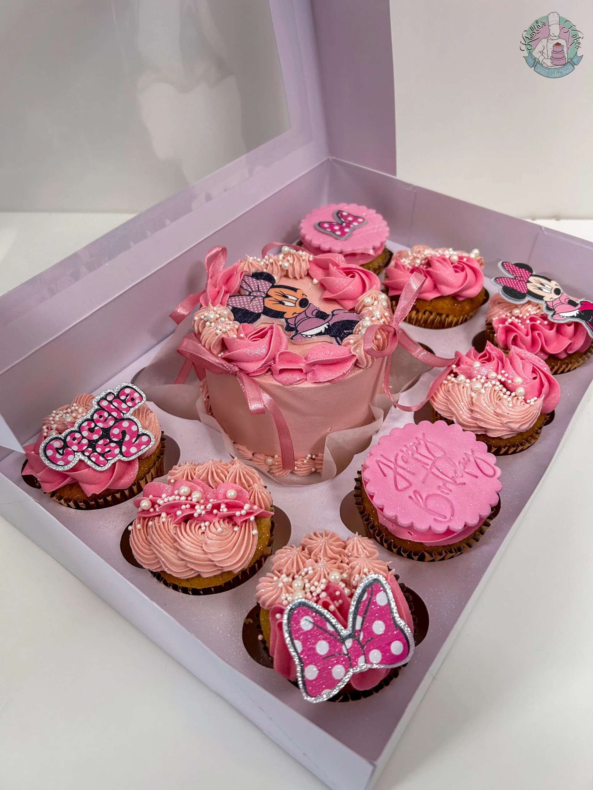 Minnie Mouse Bento Cake Birmingham — pink bento cake box with matching cupcakes, butterfly toppers and polka dot details, handmade by Khalid's Kakes