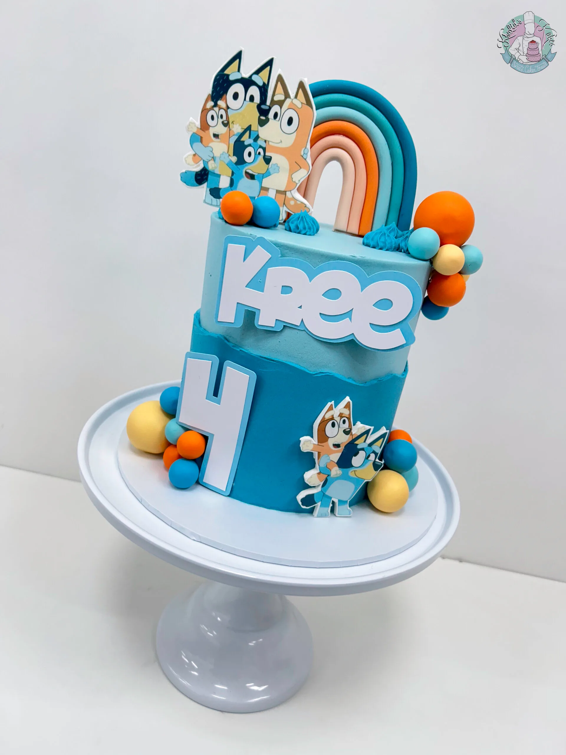 Bluey Cake Birmingham — children’s birthday cake in Bluey blue and tan.