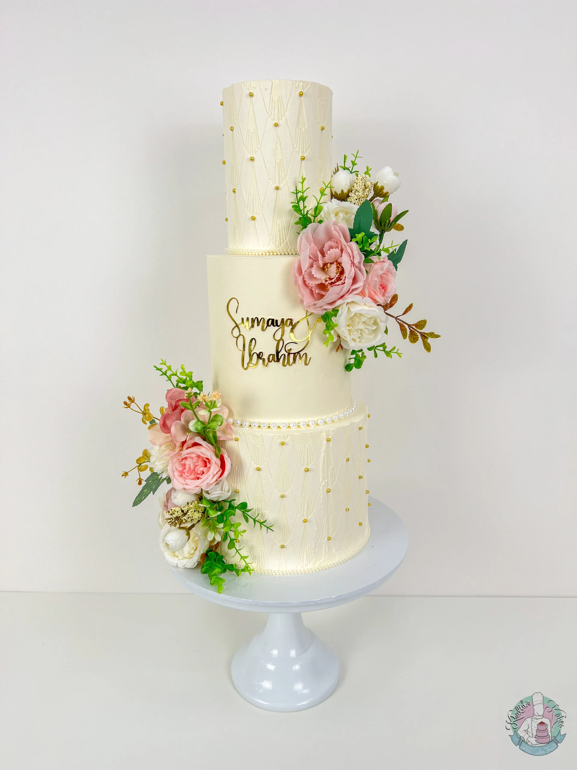 Stencil Pearl Wedding Cake Birmingham — three tier cake with delicate stencil detailing and white or gold pearls.
