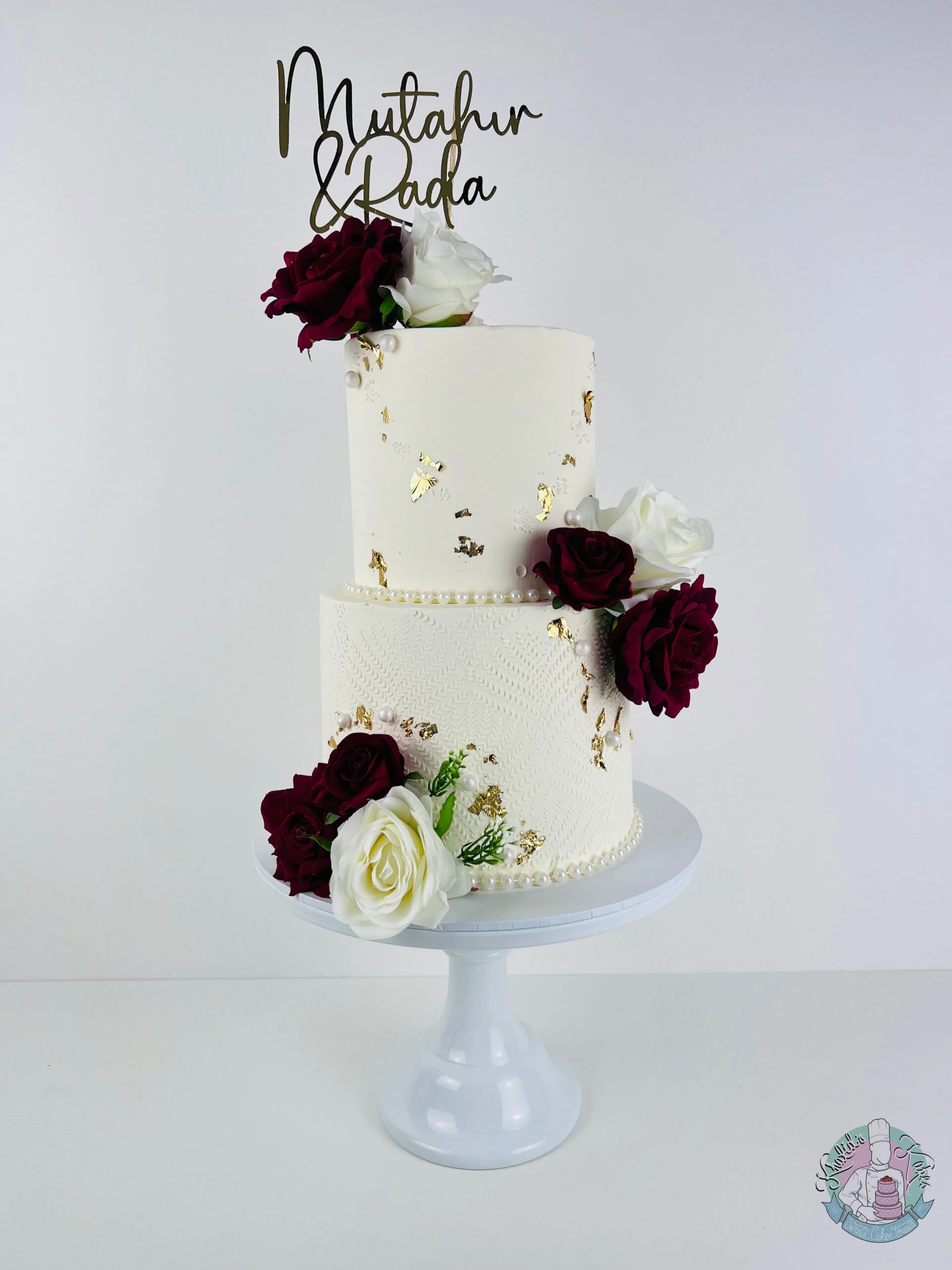 2 Tier Wedding Cake Birmingham — elegant 8 inch and 6 inch tiered cake with metallic leaf and flower colour accents.