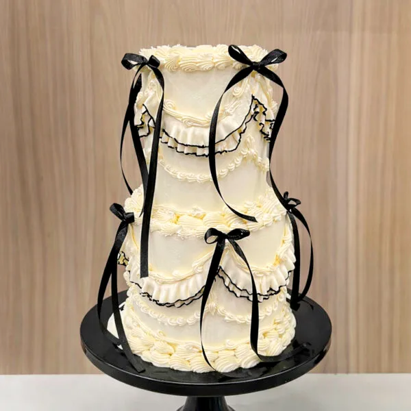 Shop 75 Vintage Piped Wedding Cake Birmingham, an elegant multi-tier cake with traditional piped buttercream, handmade by Khalids Kakes