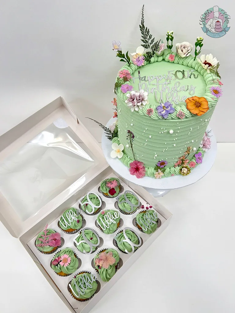 Floral Birthday Cake Birmingham, a pretty cake with sugar pearls and pressed flowers, handmade by Khalids Kakes