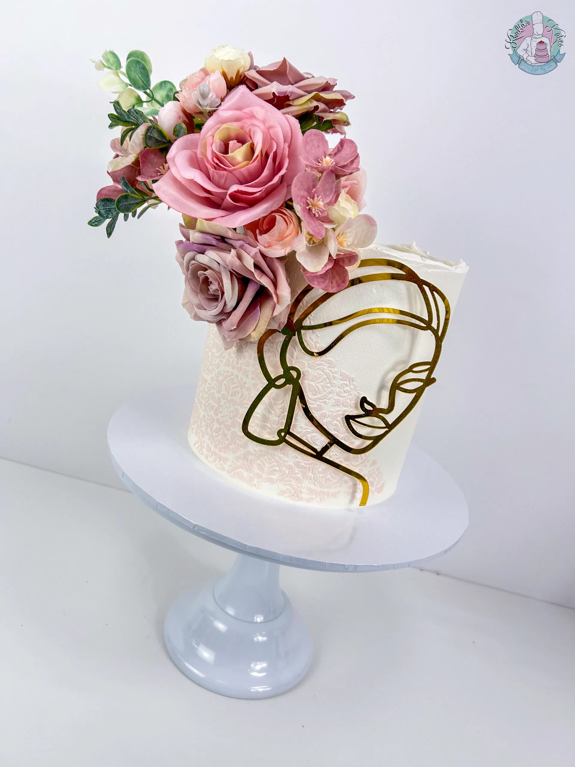Lady Line Cake Birmingham — celebration cake with elegant woman line-art, handmade by Khalid's Kakes