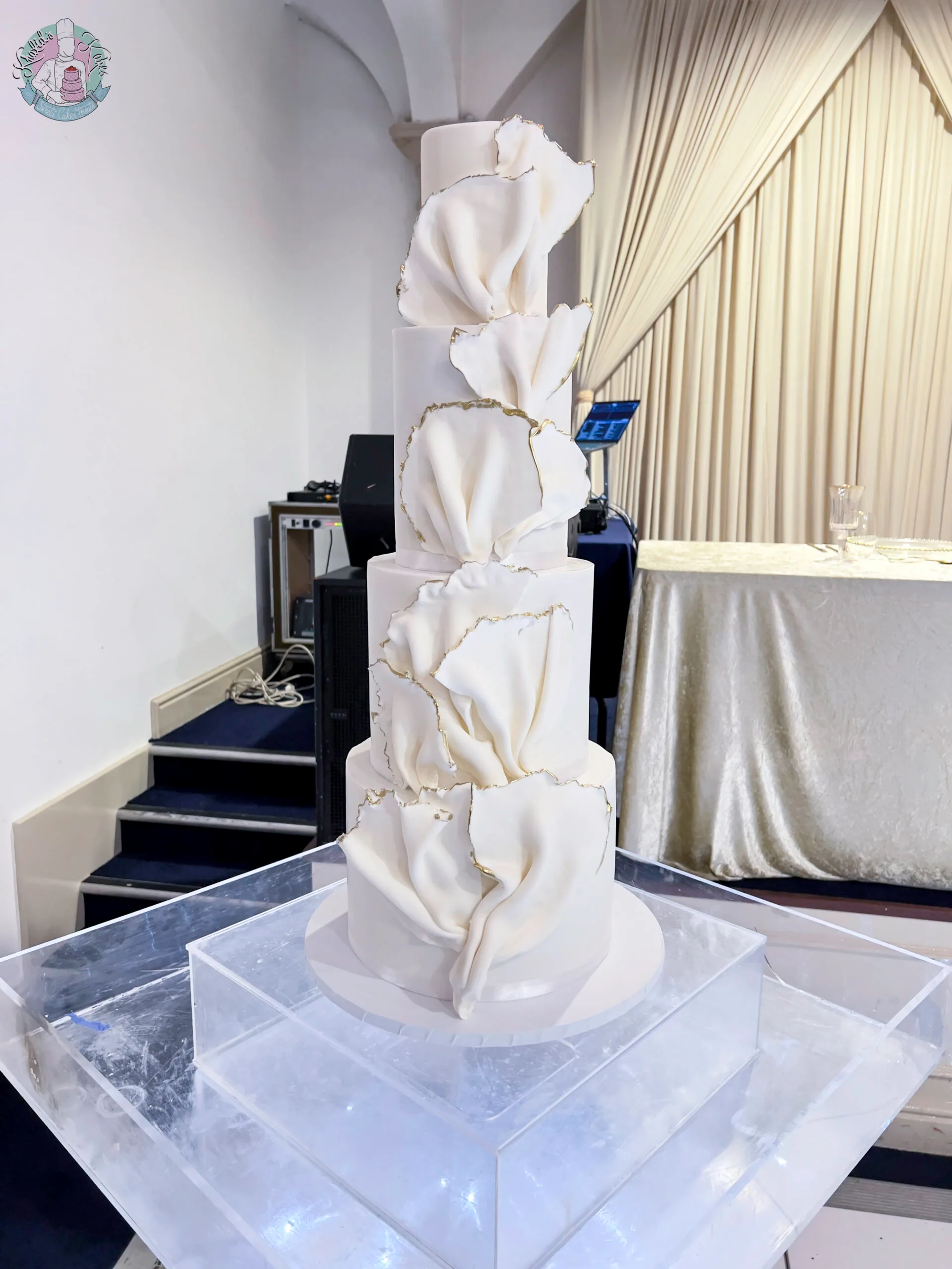 Sail Wedding Cake Birmingham — modern multi-tier cake with a sail feature, buttercream or fondant finish and acrylic toppers.