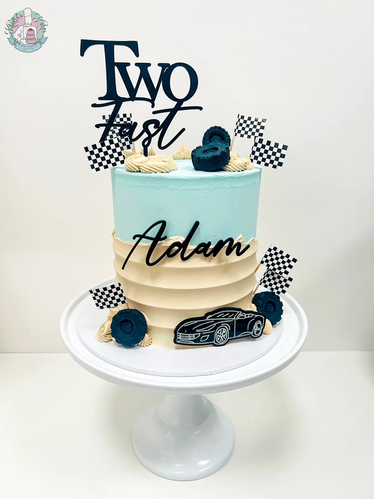 Two Fast Cake Birmingham — children’s 2nd birthday cake with checkered flags and racing cars.
