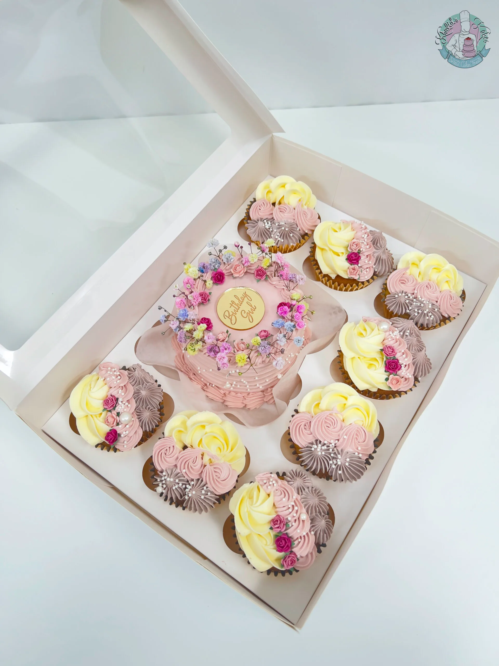 Vintage Bento Cake Birmingham, a mini bento cake with matching cupcakes in pastel colours, handmade by Khalids Kakes