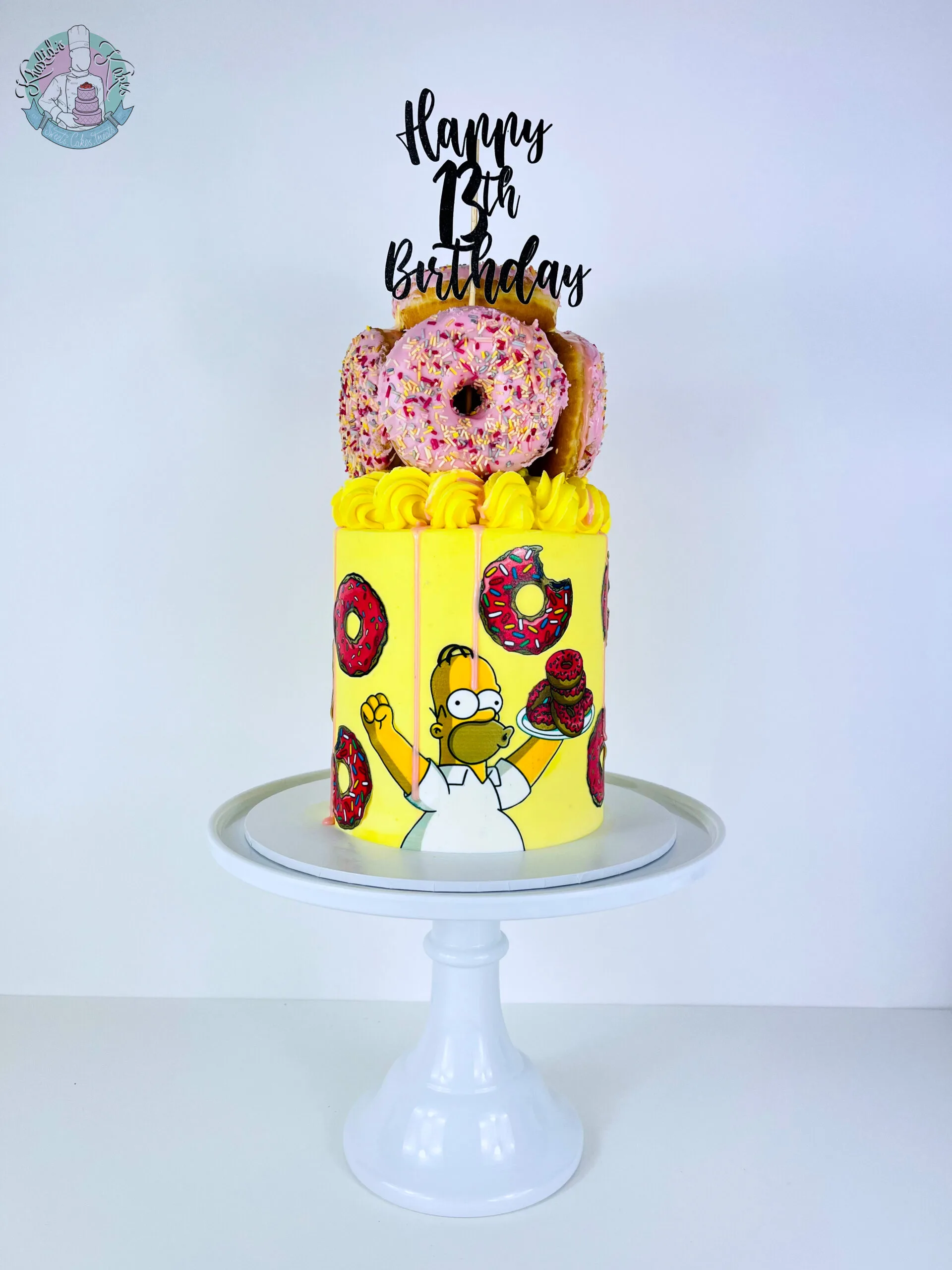 Simpsons cake Birmingham — Simpsons themed celebration cake, handmade by Khalid’s Kakes