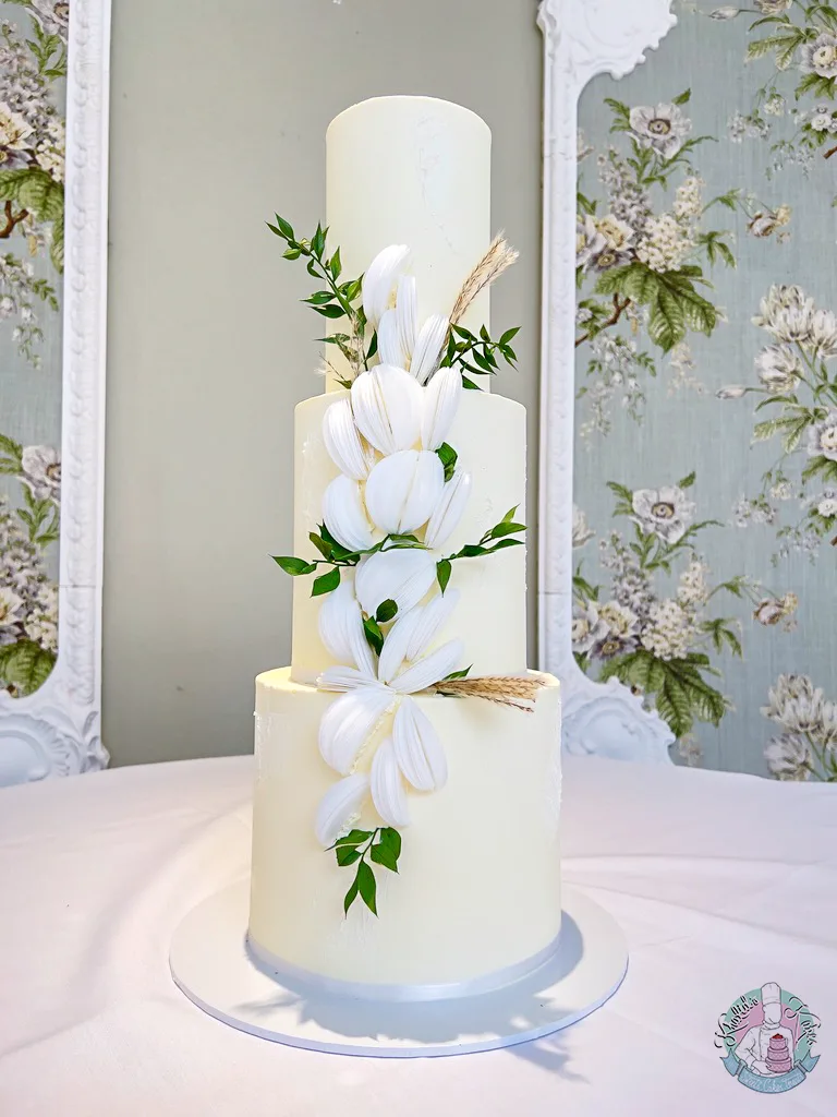 Wafer Ruffle Wedding Cake Birmingham — contemporary tiered cake with hand-cut wafer paper ruffles, dried florals and silk ribbon.