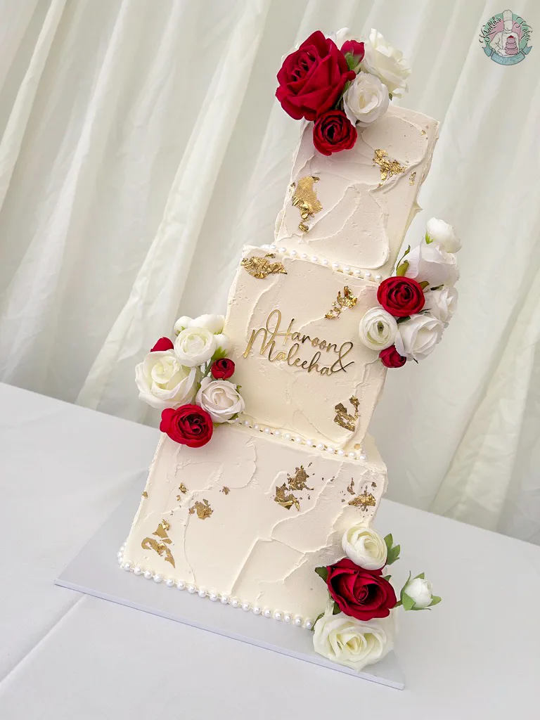 Square Textured Wedding Cake Birmingham — square tiered cake with rich texture and gold, silver or rose gold metallic leaf accents.