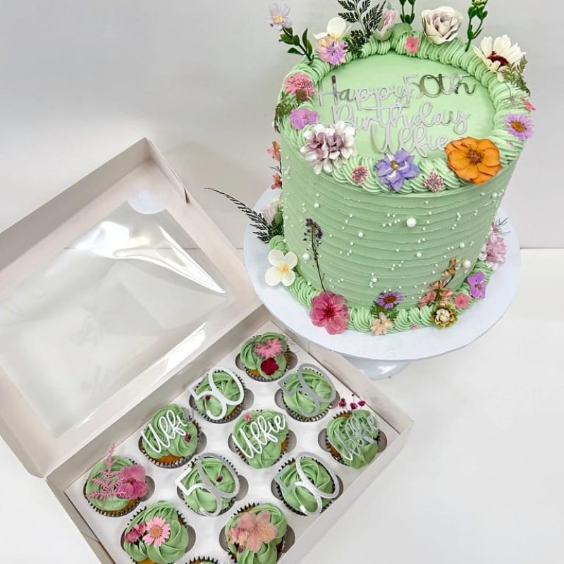 Floral Birthday Cake Birmingham, a pretty cake with sugar pearls and pressed flowers, handmade by Khalids Kakes