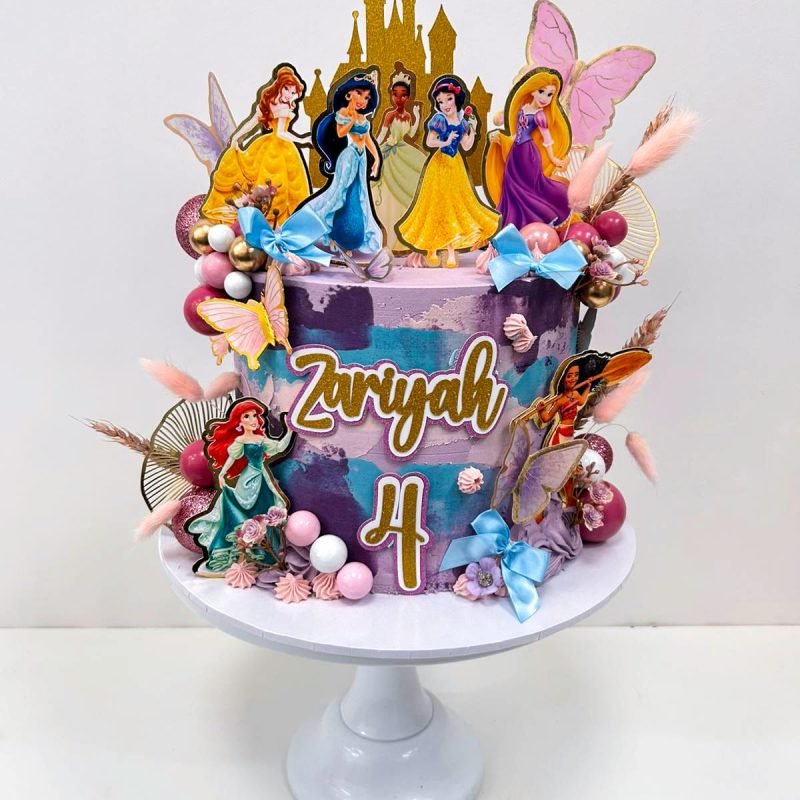 Disney Princess Cake 3 Birmingham — multi-tier cake with Disney princess figures, castle topper and personalised name and age, handmade by Khalid's Kakes