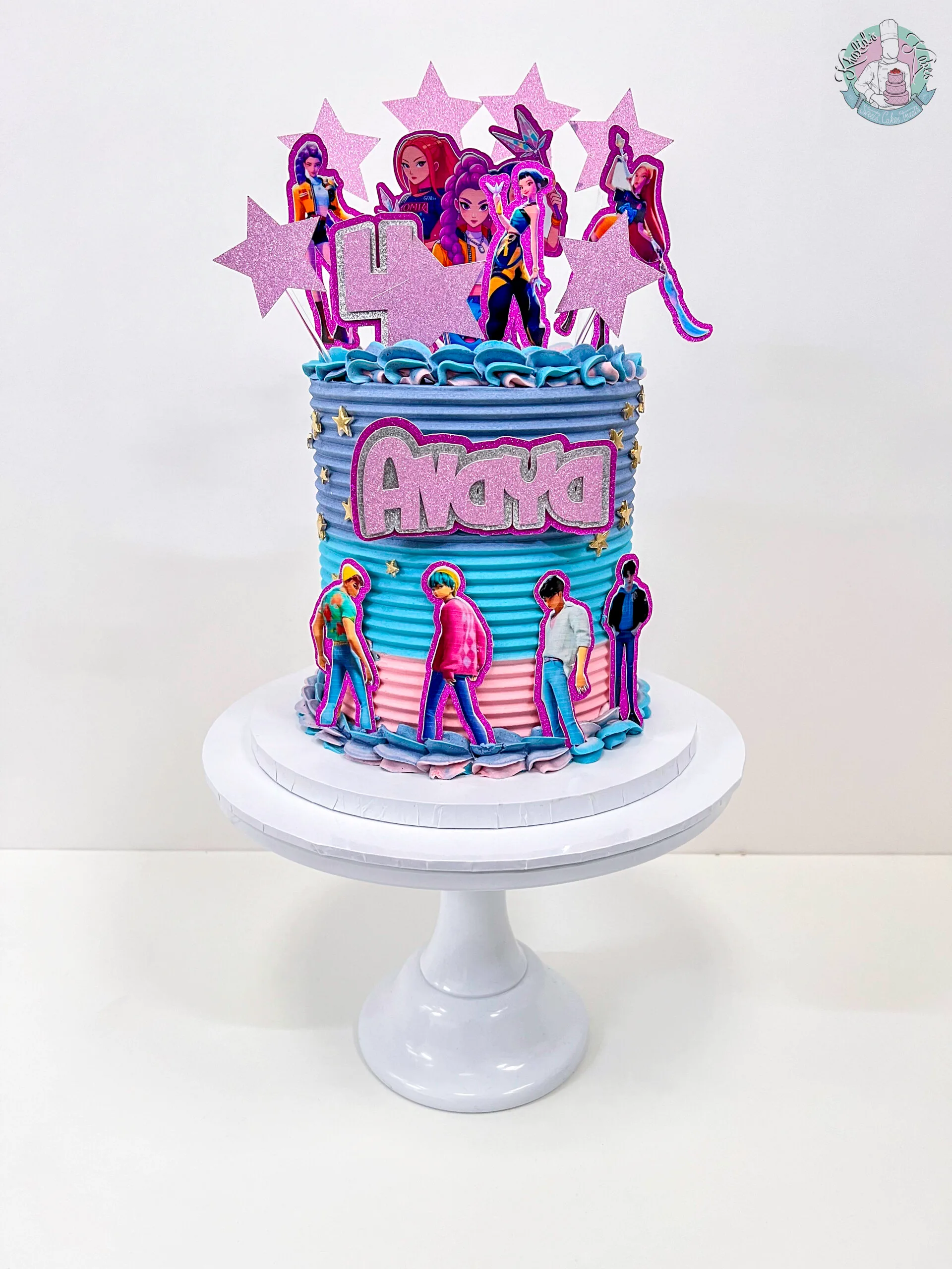 Kpop Demon Hunters Cake Birmingham — children’s birthday cake with bold neon stage colour.