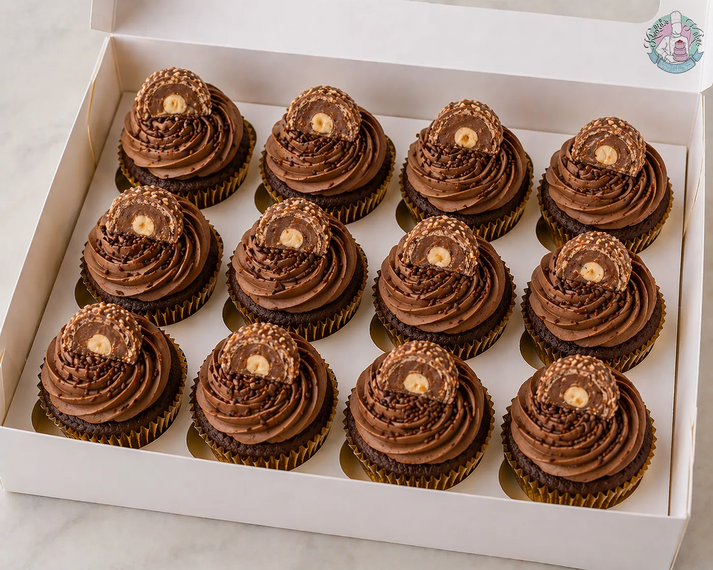 Ferrero Rocher Cupcakes Birmingham — chocolate cupcakes topped with Ferrero Rocher and hazelnut buttercream, handmade by Khalid's Kakes