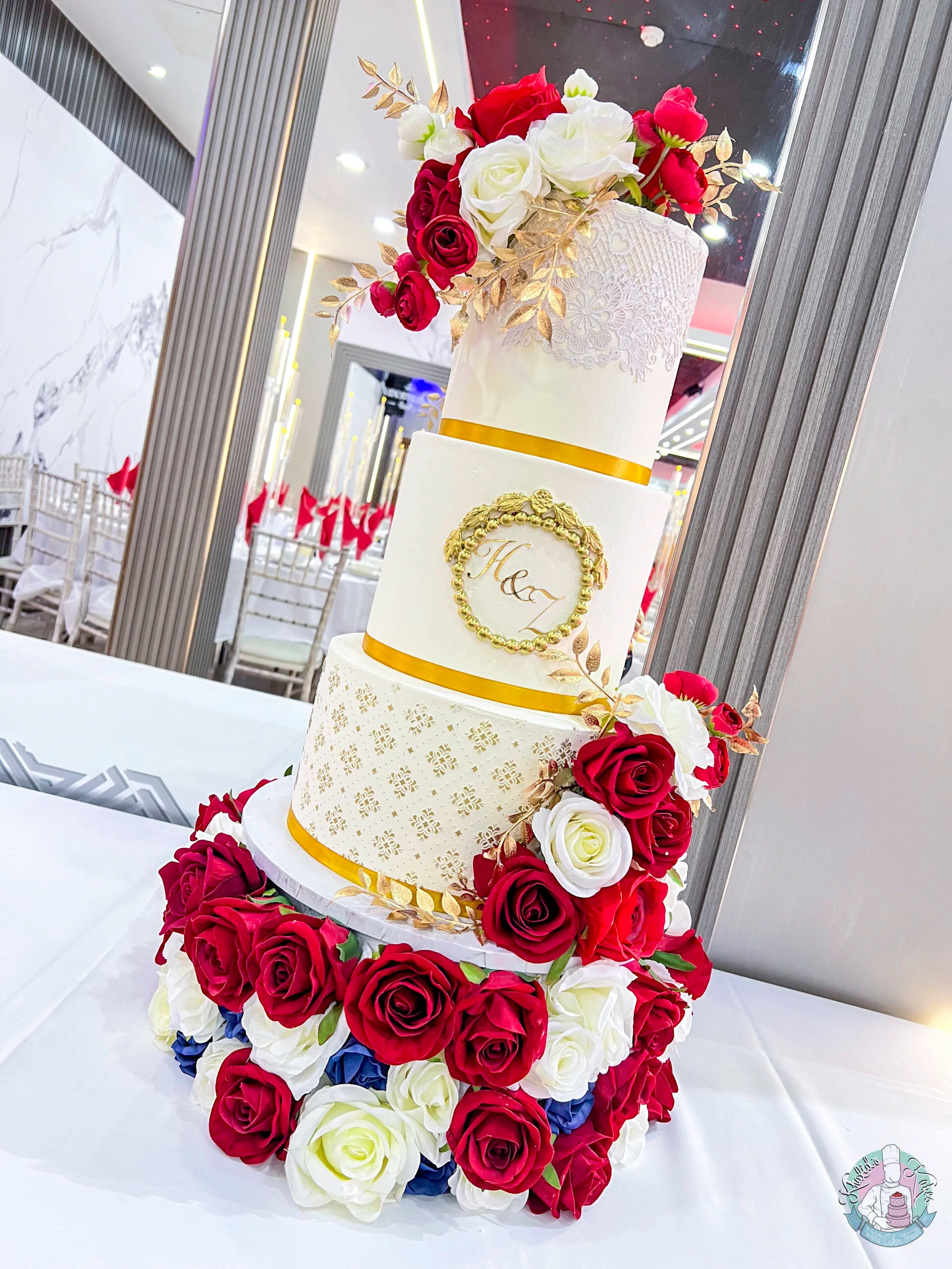 Golden Wedding Cake 2 Birmingham — tiered cake with edible lace, a fondant plaque, metallic stencil tier and gold leaf accents.