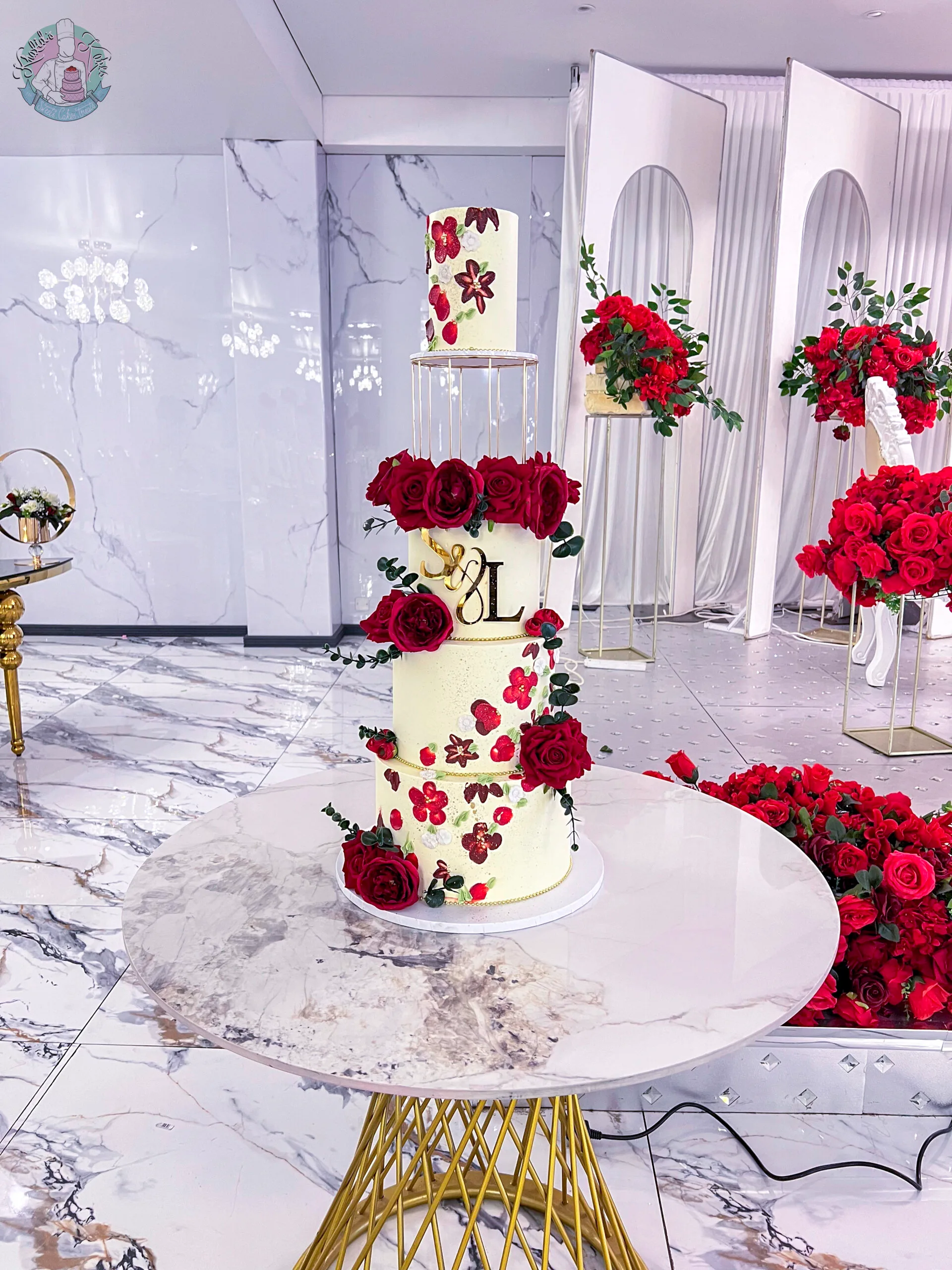Cage Wedding Cake 3 Birmingham — tiered cake with hand-piped 3D floral petals and a decorative gold cage.