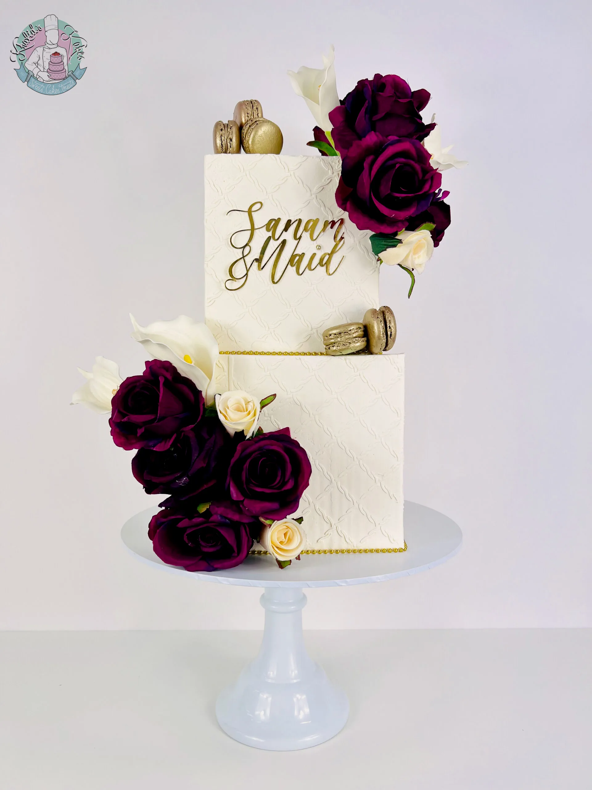 Square Stencil Wedding Cake 2 Birmingham — square tiered cake with textured stencil pattern and macaron detailing.