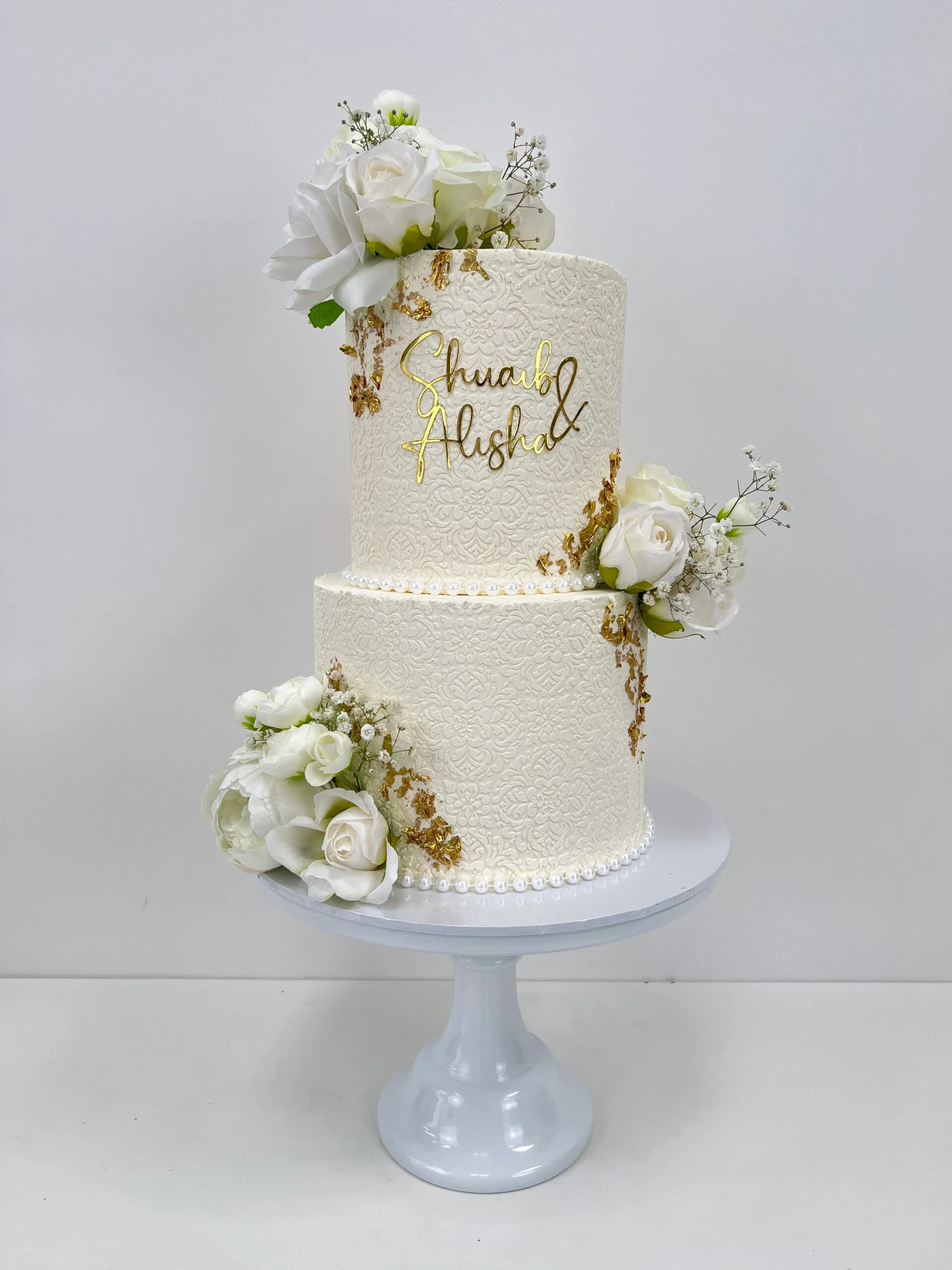 Stencil Wedding Cake 4 Birmingham — tiered cake with delicate stencil detailing and metallic leaf accents.
