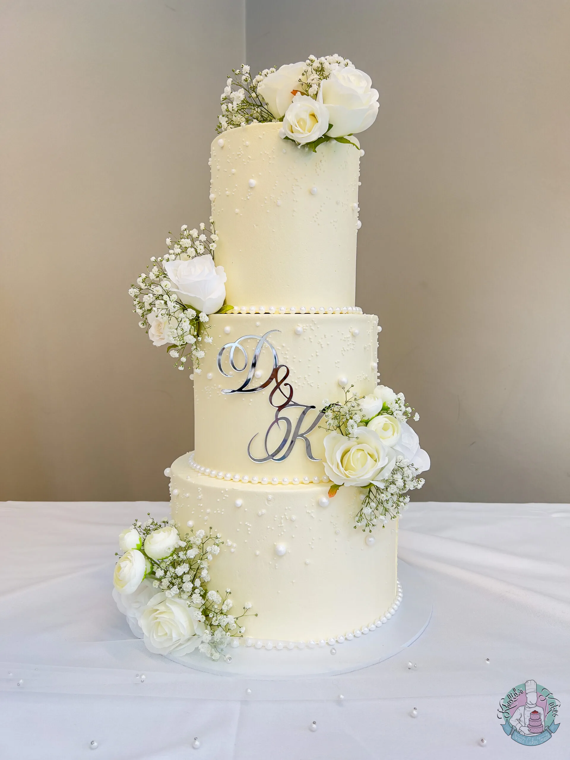 Pearl Wedding Cake Birmingham, an elegant tiered cake with pearl detailing, handmade by Khalids Kakes