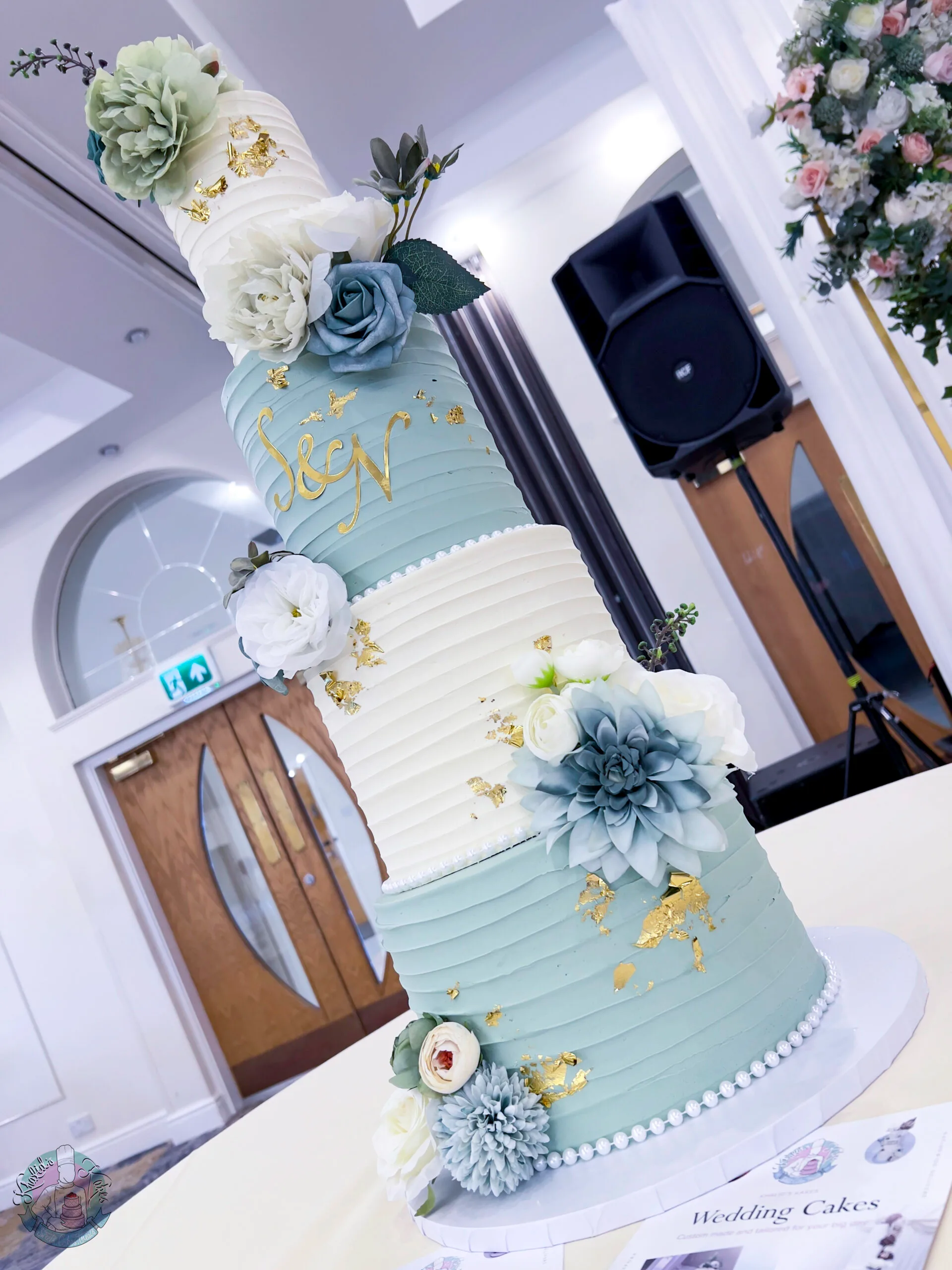 Coloured Wedding Cake Birmingham — two or three tier cake with metallic leaf in gold, silver or rose gold and vibrant buttercream colours.