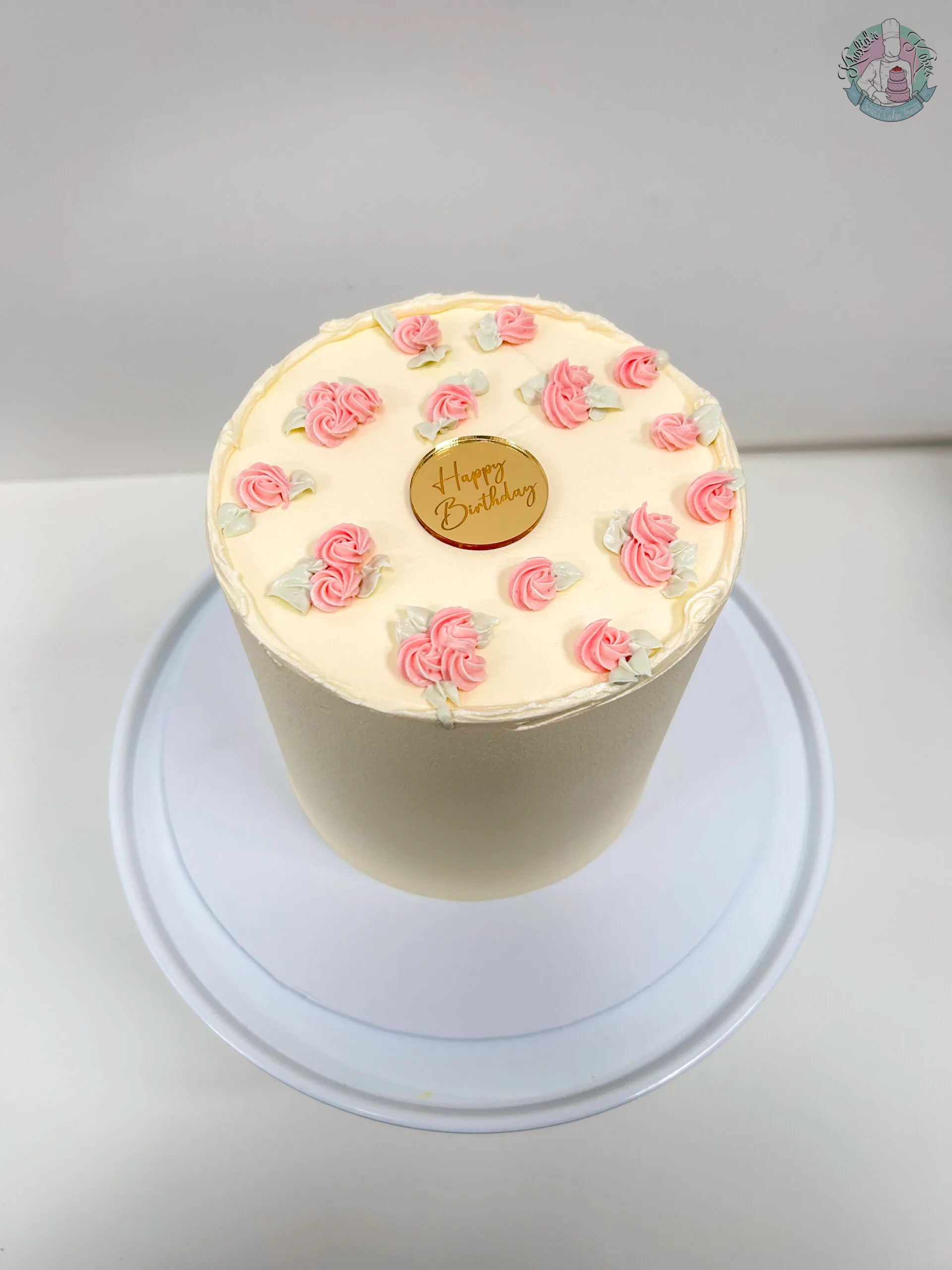 Rose bud cake Birmingham — elegant cake with rose bud detailing, handmade by Khalid’s Kakes