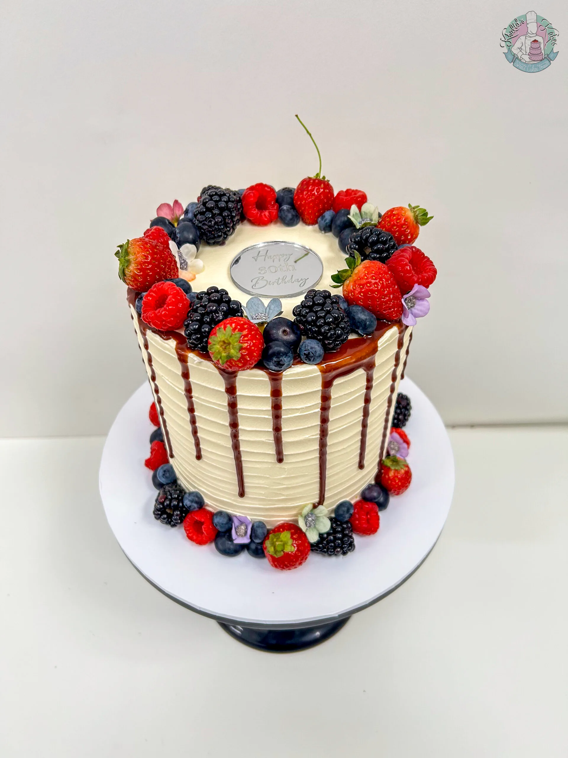 Berry birthday cake Birmingham — fresh strawberries, raspberries and blueberries on vanilla buttercream, handmade by Khalid's Kakes