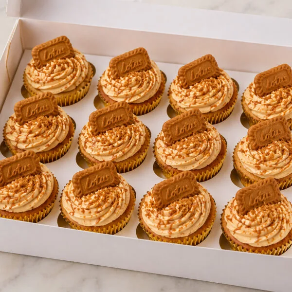Shop 15 Lotus Biscoff Cupcakes Birmingham, a box of 12 vanilla cupcakes with caramel buttercream and Lotus biscuits, by Khalids Kakes