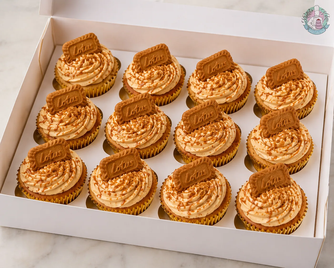 Lotus Biscoff Cupcakes Birmingham, a box of 12 vanilla cupcakes with caramel buttercream and Lotus biscuits, by Khalids Kakes